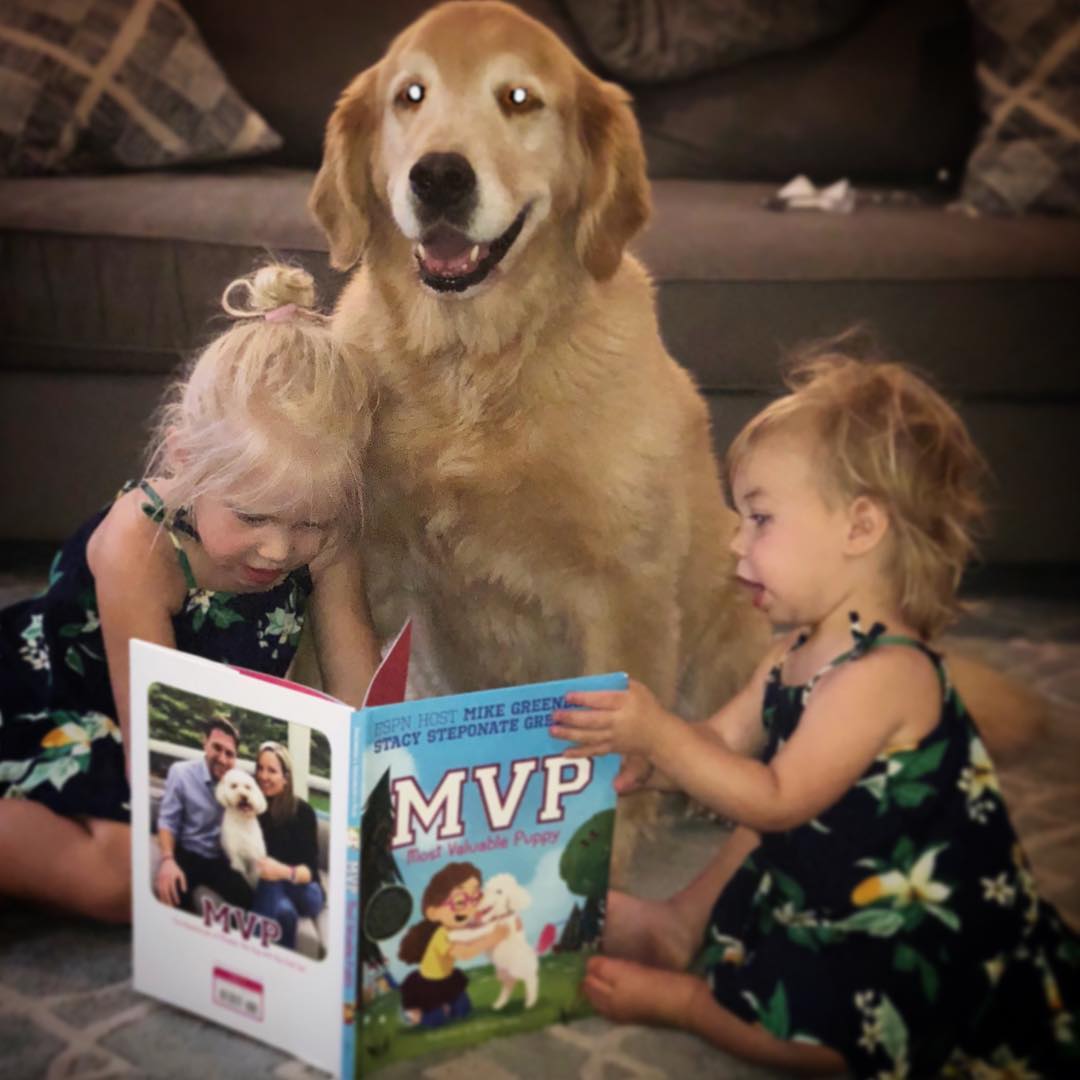 Blake with sister Finley reading the book MVP